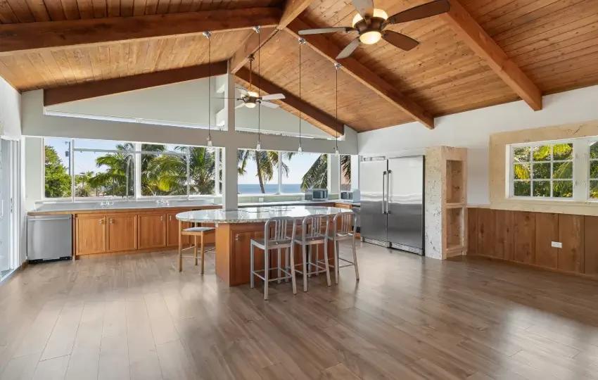 Tongue and groove wood ceiling with custom wood ceiling beams