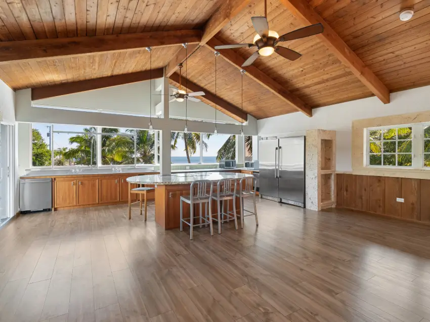 Tongue and groove wood ceiling with custom wood ceiling beams